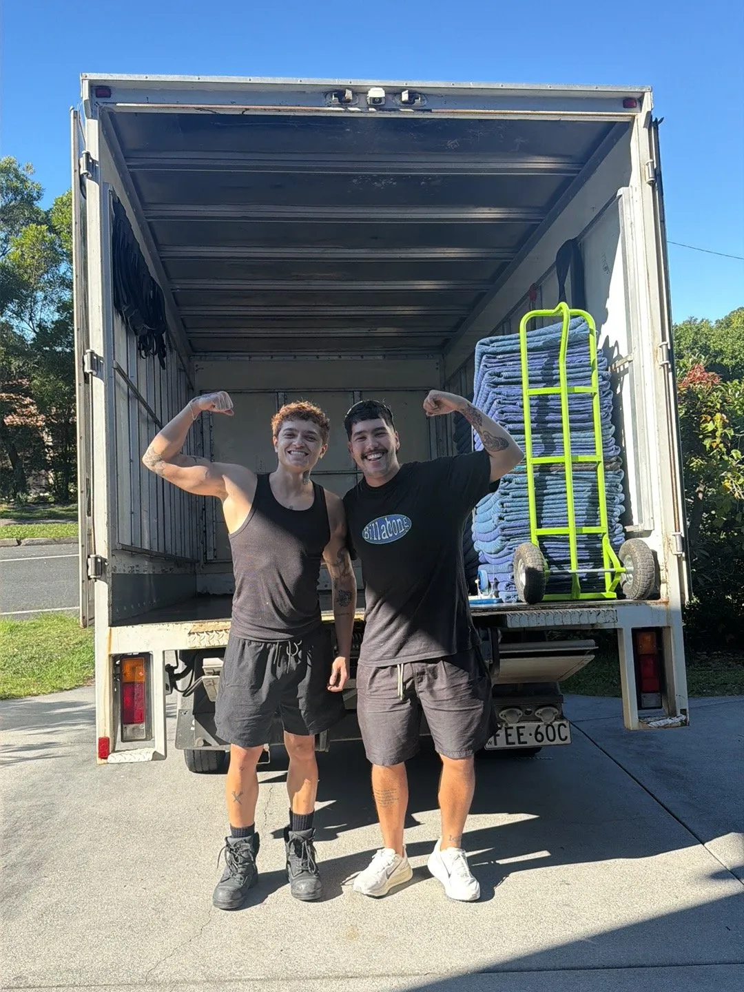 MT&T removalists standing in front of the open truck