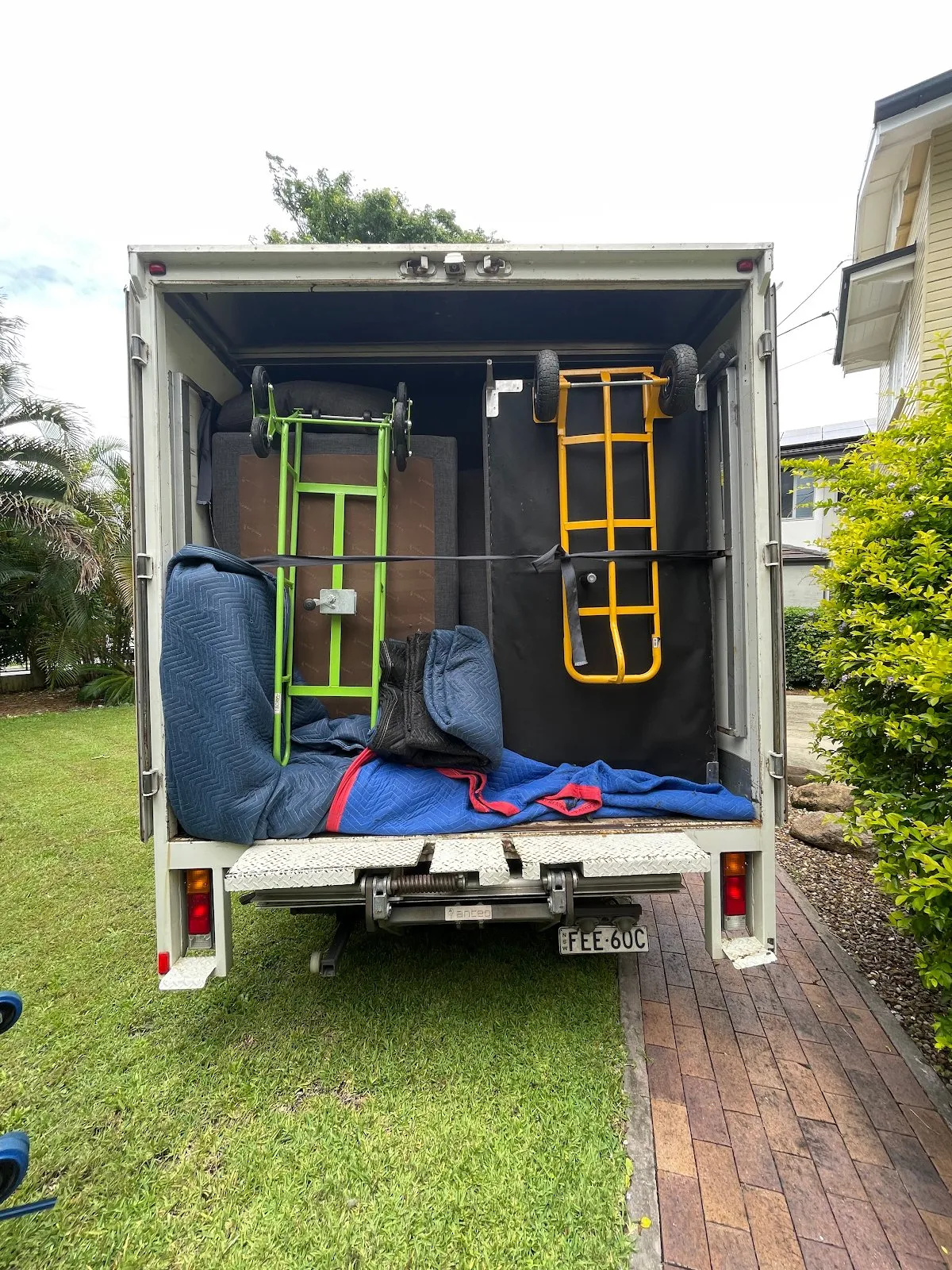 MT&T truck with trolleys and moving blankets ready to go